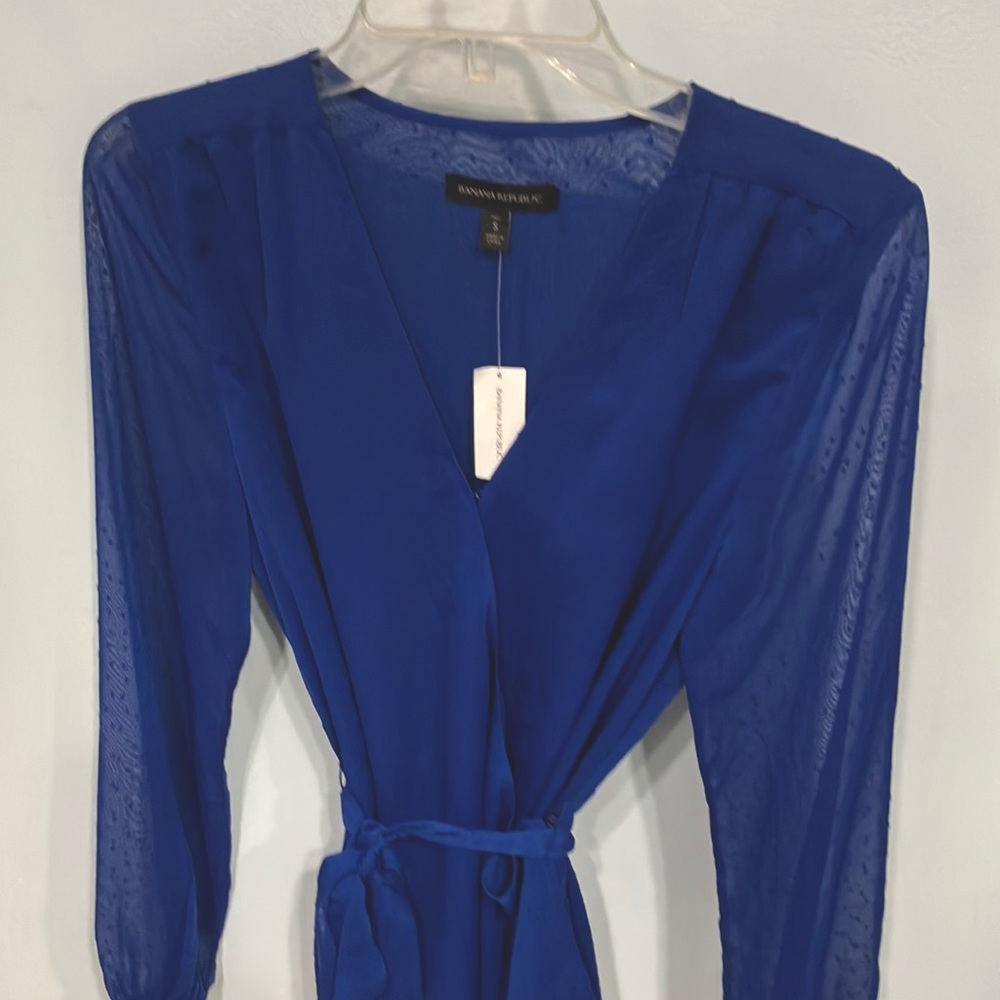 Banana Republic Royal blue wrap blouse w/tie. Lacy sleeves, full body lined. New
